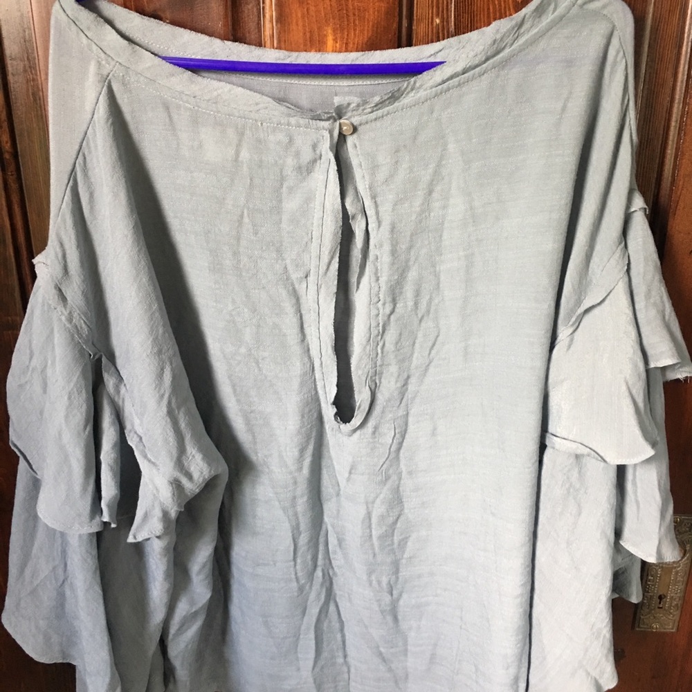 Slate blue flowy blouse.